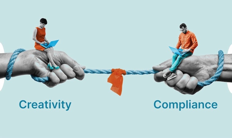 Creativity and Compliance represented as hands pulling rope
