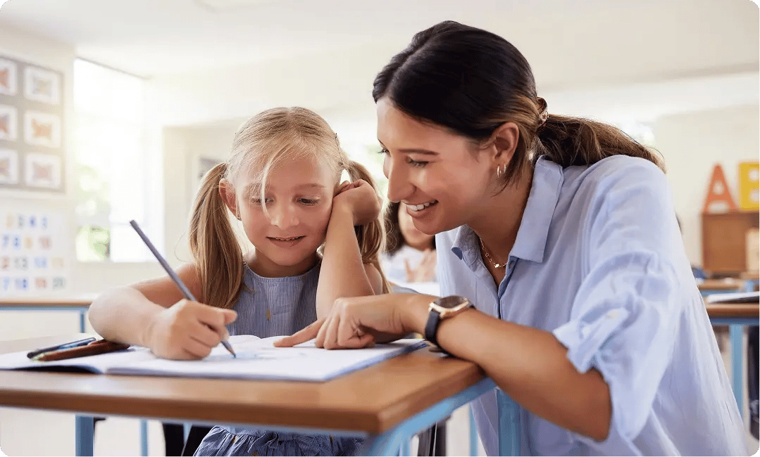 Folens publishers hero background - adult woman teaching at primary school-1