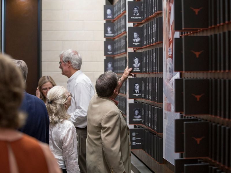 The University of Texas Athletics Hall of Fame people watching sportsmen cards