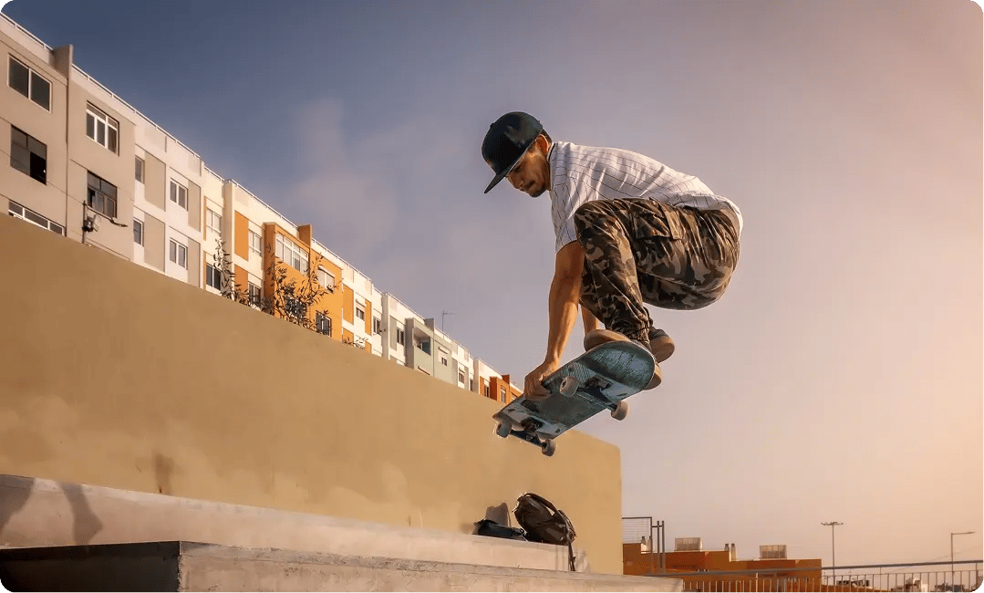 Man with a NHS skateboard in hand admiring the sunset-1