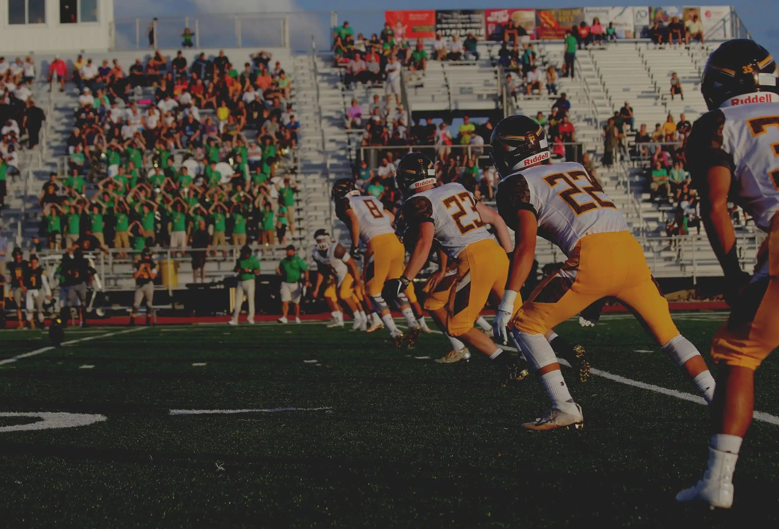 NFL Football teams running against each other in a match