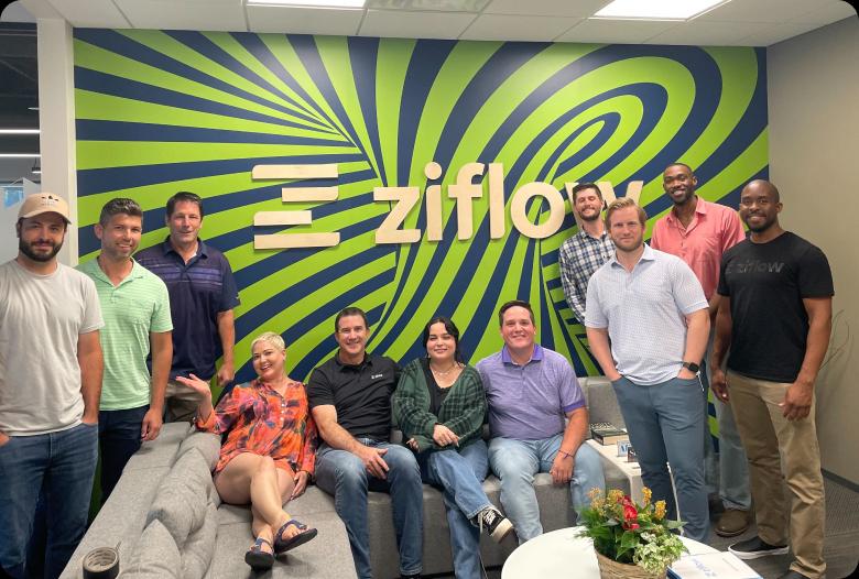 Ziflow team gathered up together in a lounge of office in Texas-1