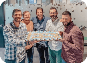 Ziflow team with a cake at the Dallas office