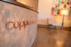 Copperwing company logo at reception