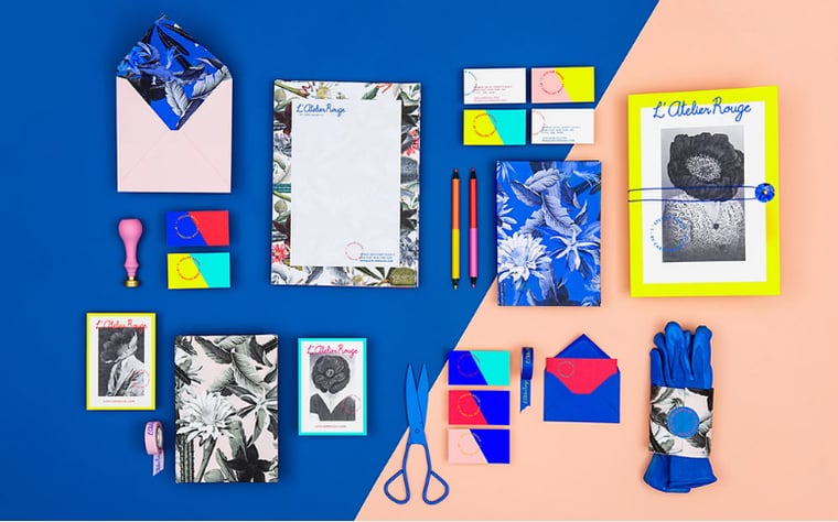 Branding and colorful materials collection with scissors, pens, notebooks and so on